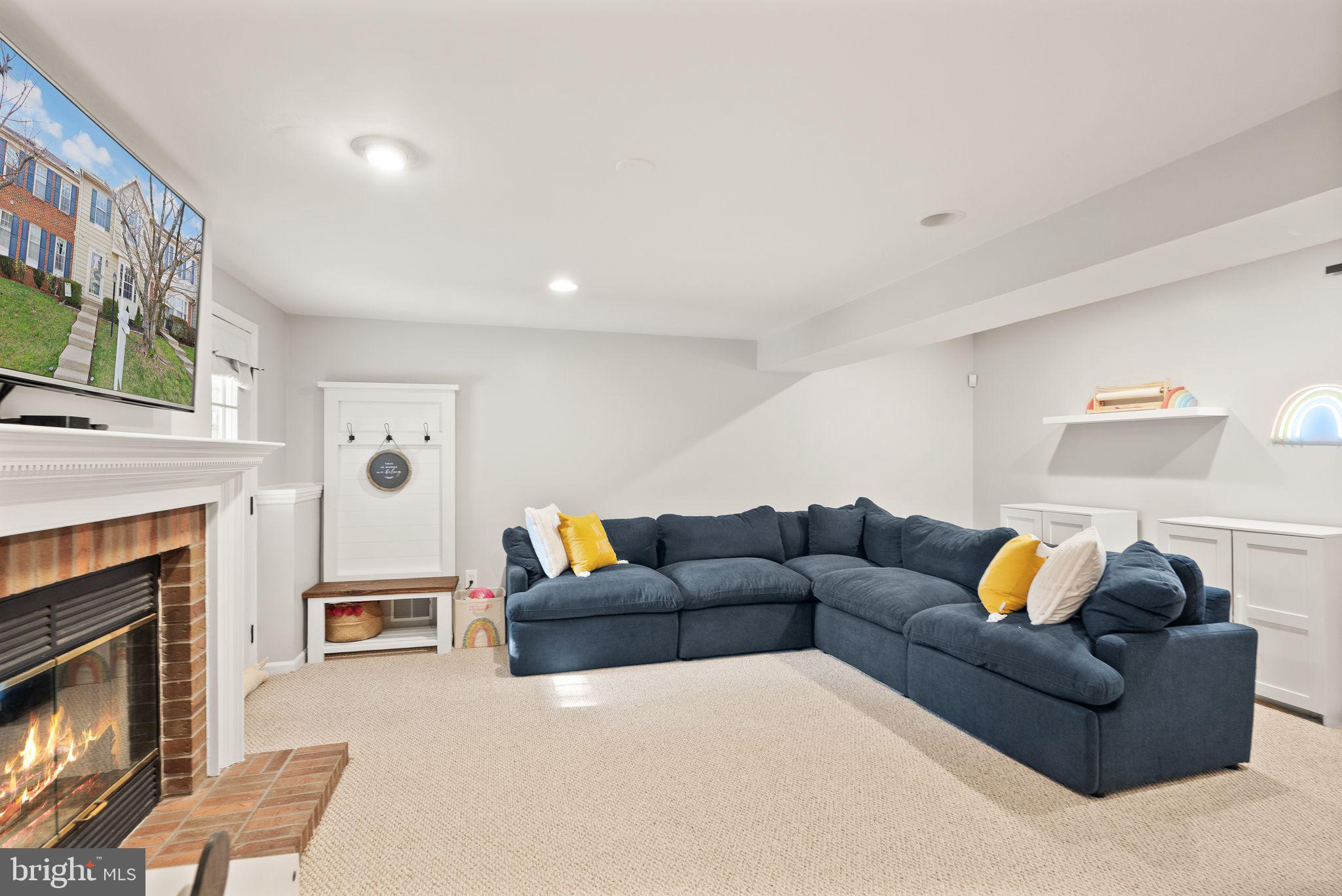 6020 Kestner Circle Alexandria, VA 22315 - Photo 35 of 59 a living room with furniture and a fireplace