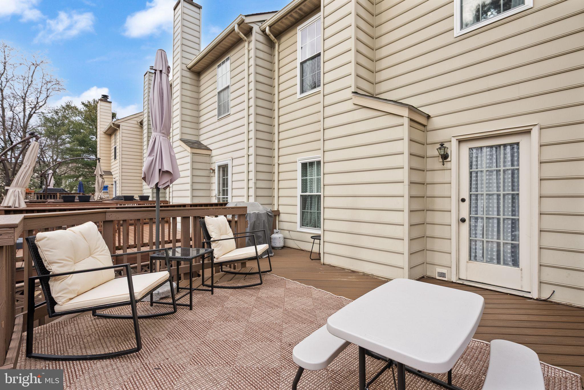 6020 Kestner Circle Alexandria, VA 22315 - Photo 40 of 59 a balcony with table and chairs