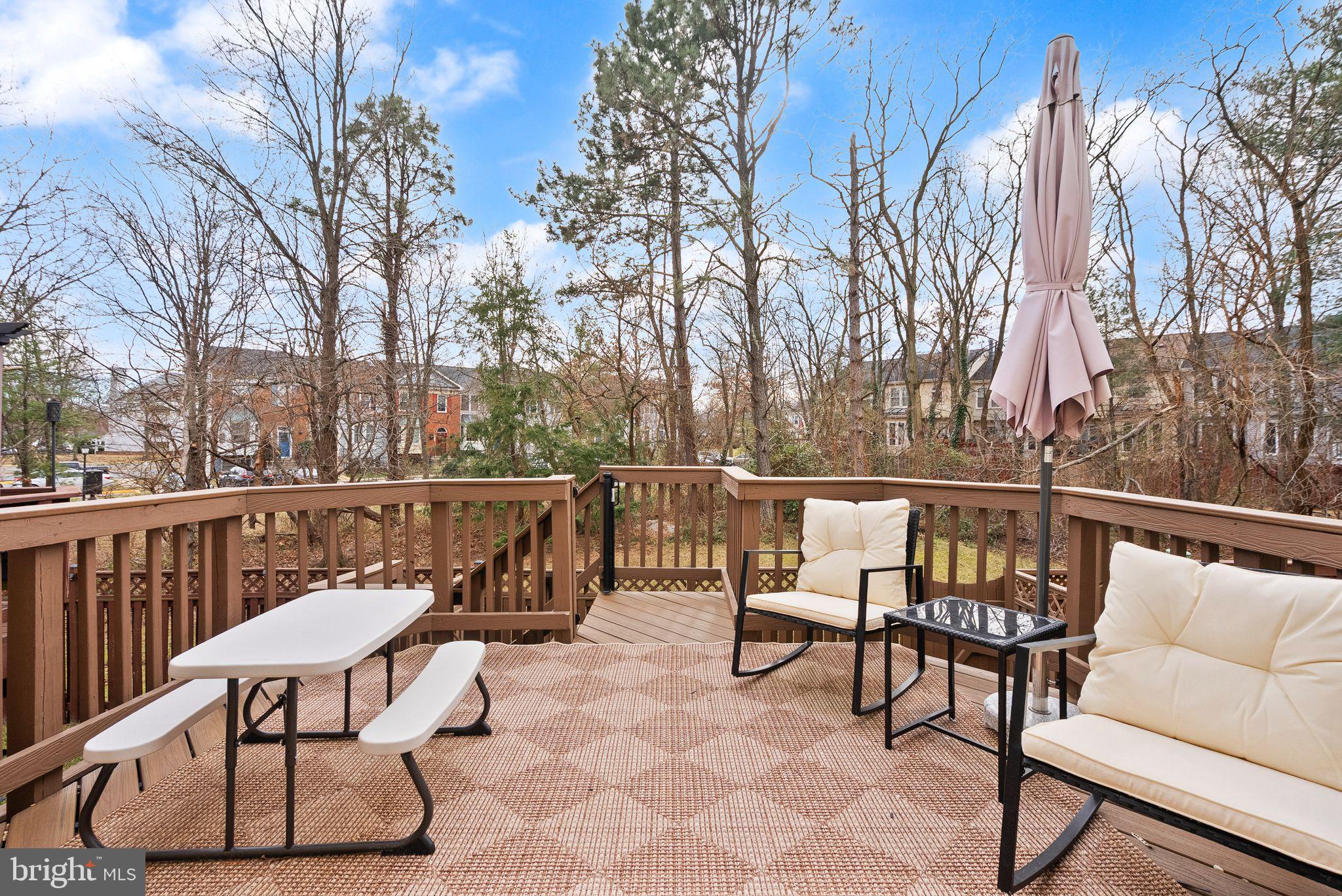 6020 Kestner Circle Alexandria, VA 22315 - Photo 41 of 59 a view of a chairs and table on the deck
