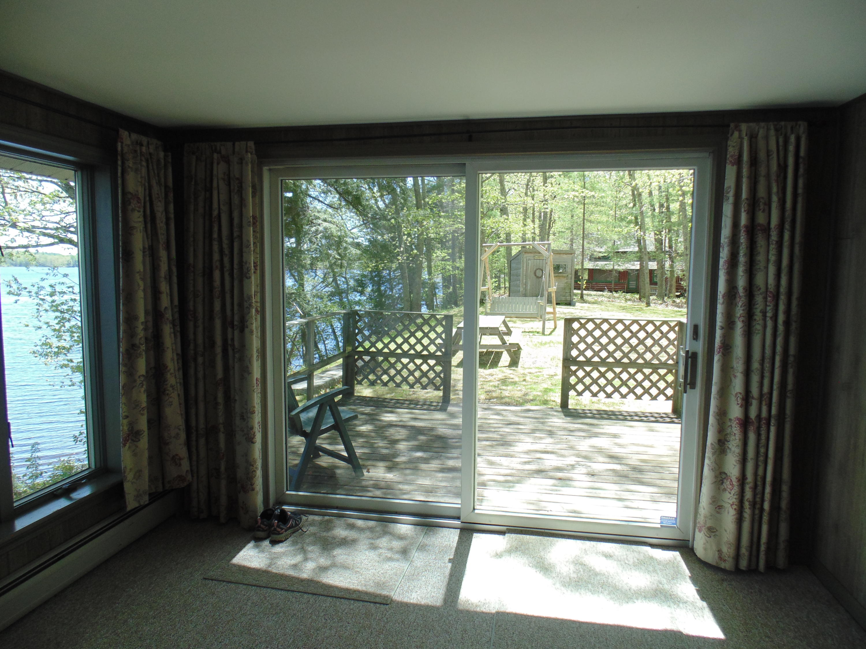 301 Kanokolus Road Unity, ME 04988 - Photo 17 of 34 Side Deck off Sun Porch
