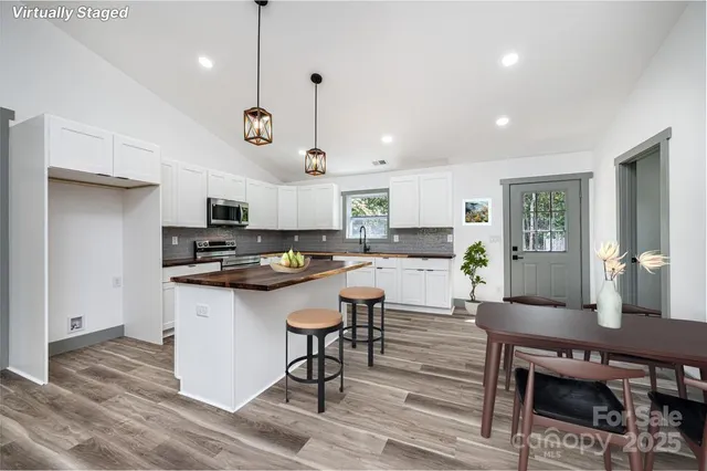 a view of balcony with wooden floor