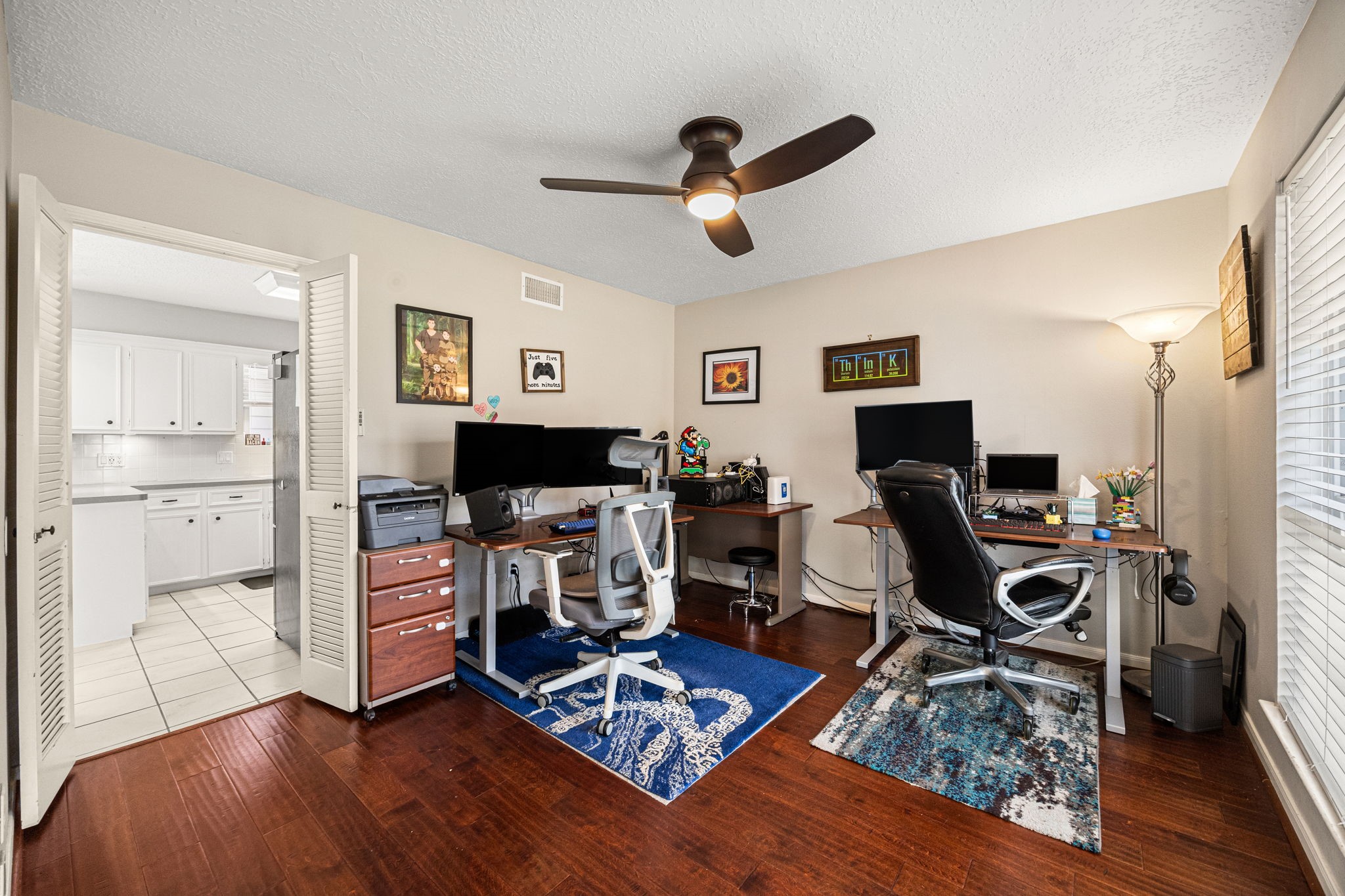 7023 Rosebrook Circle Spring, TX 77379 - Photo 12 of 29 a view of a workspace with wooden floor and a window