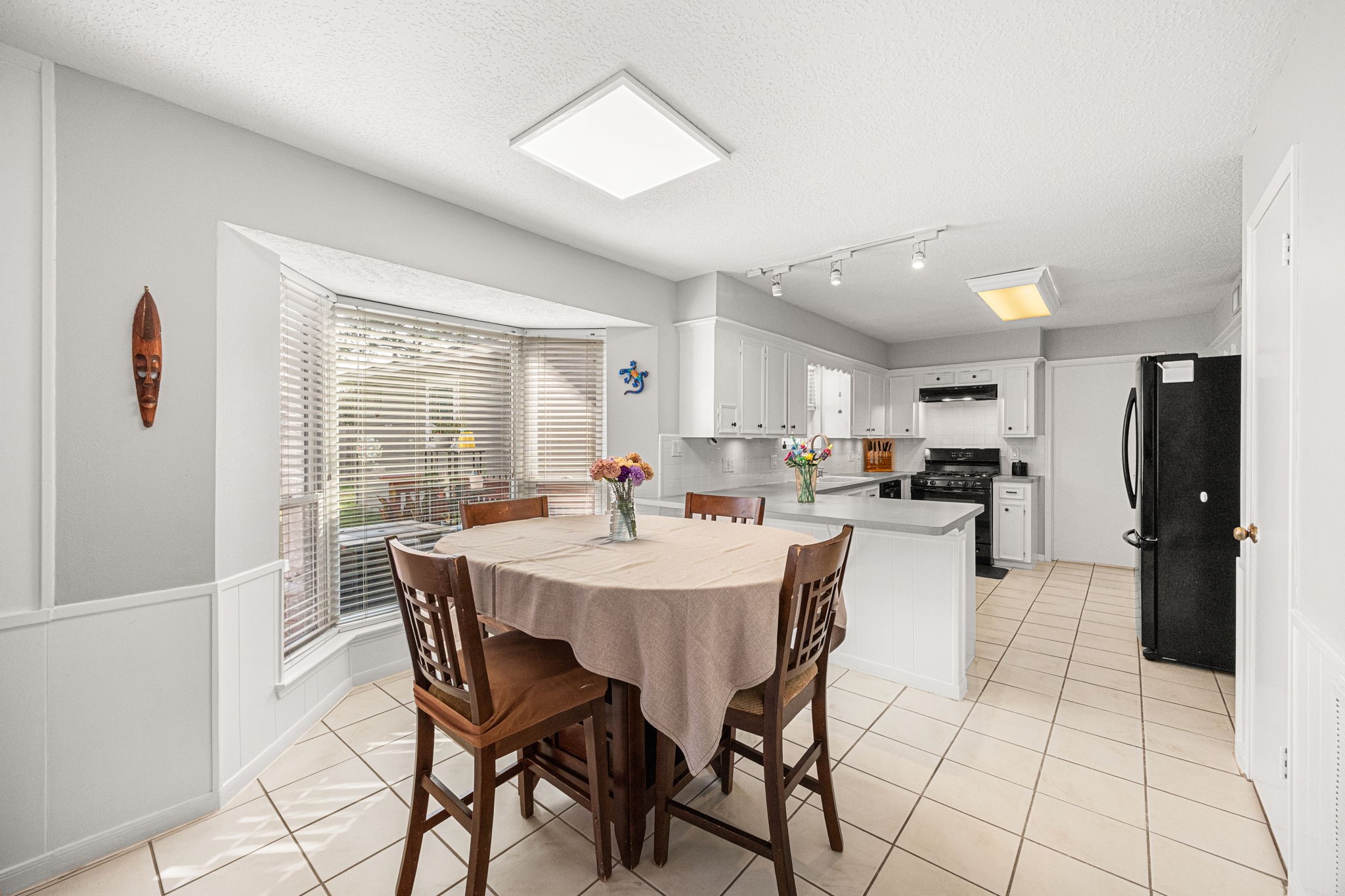 7023 Rosebrook Circle Spring, TX 77379 - Photo 8 of 29 a view of a dining room with furniture and a window