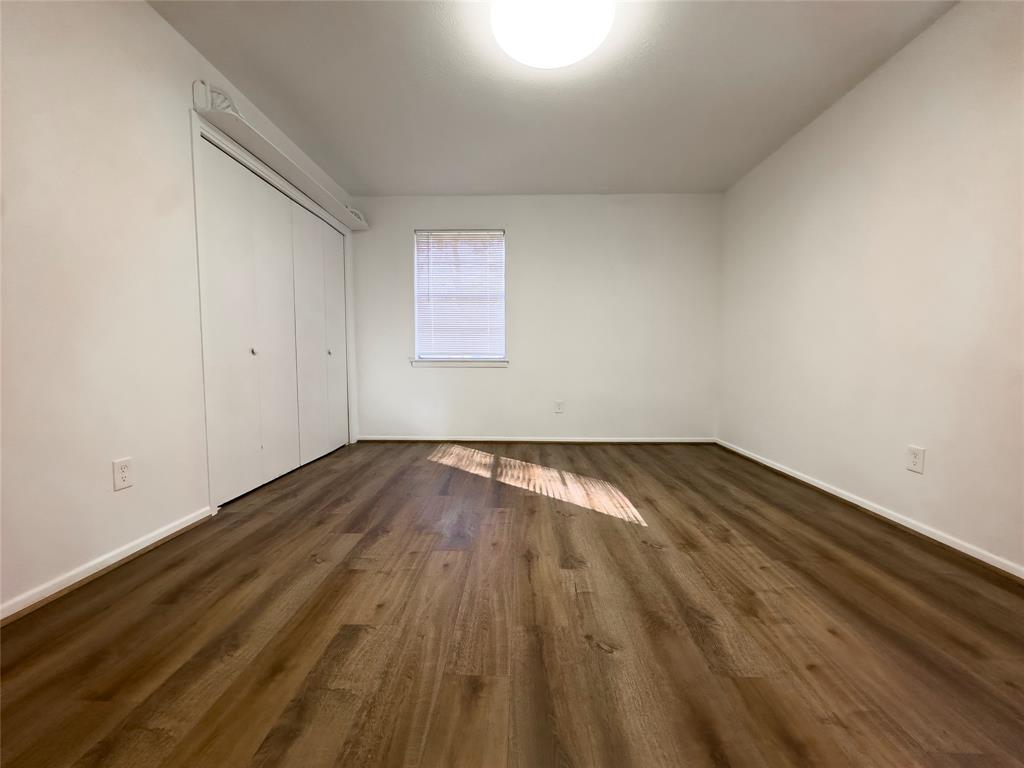 1938 Spring Drive Keller, TX 76262 - Photo 13 of 16 a view of empty room with wooden floor