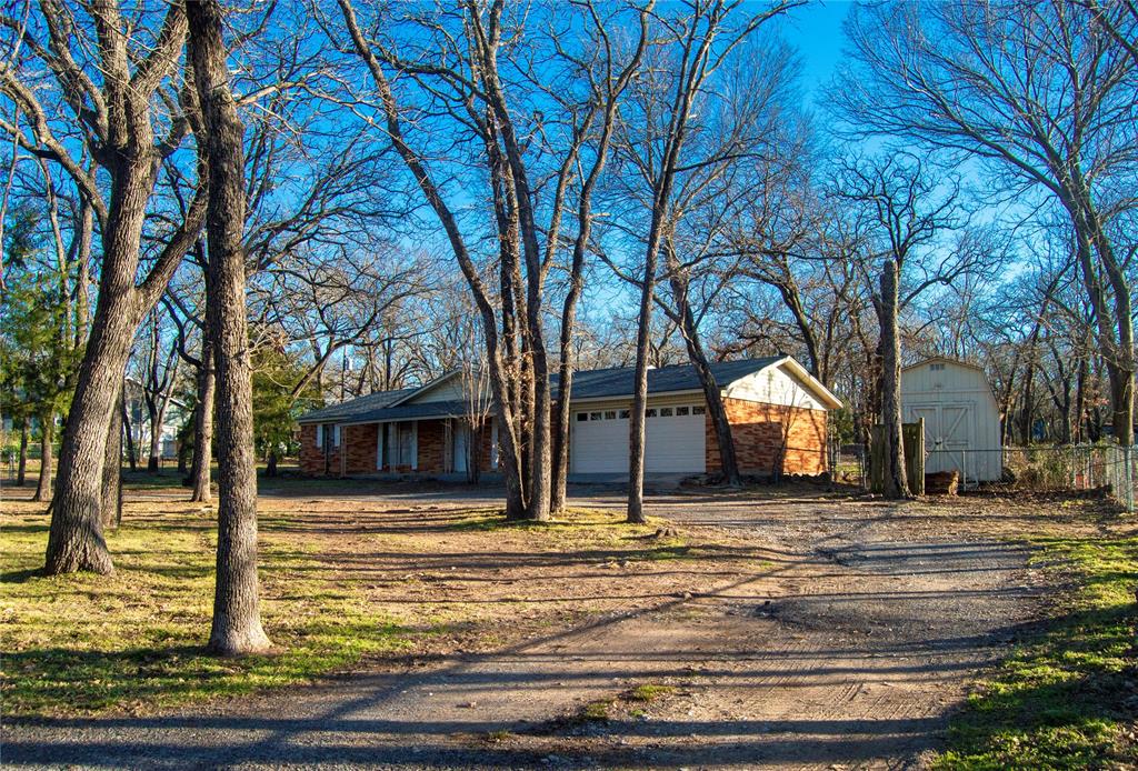 1938 Spring Drive Keller, TX 76262 - Photo 5 of 16 a view of a house with snow on the wall