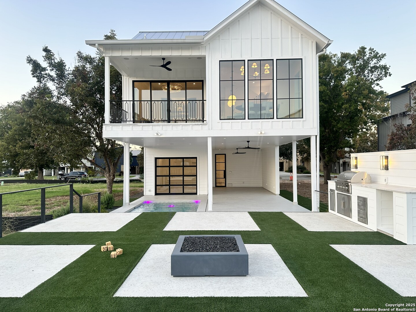front view of a house with a yard