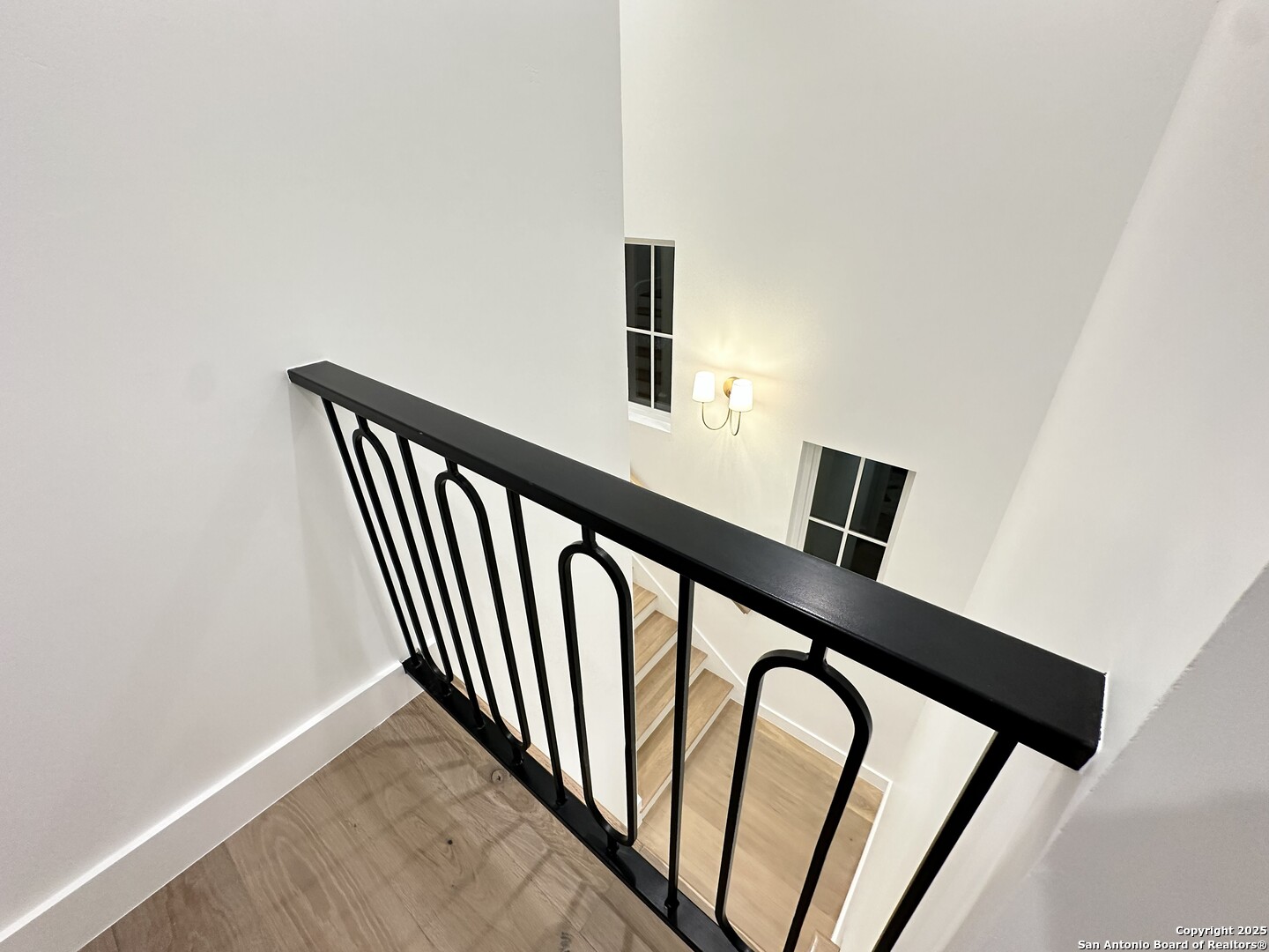 508 Lake Street Kingsland, TX 78639 - Photo 26 of 30 a view of staircase with railing and white walls