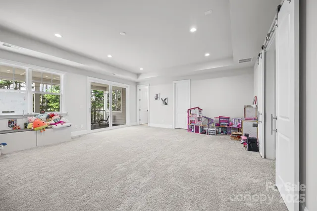 a view of a room with toys and a window