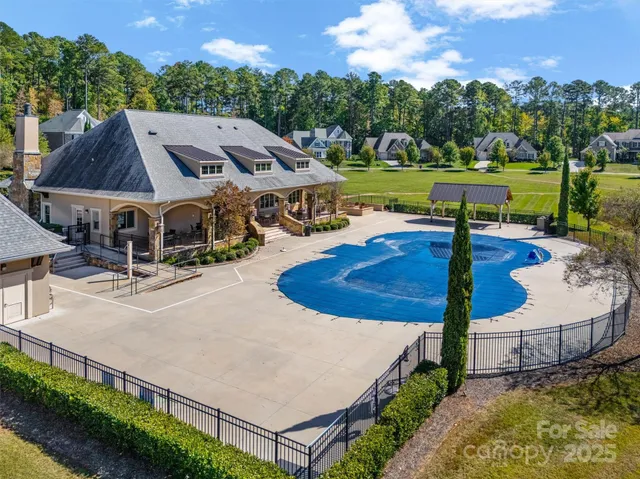 a view of a backyard with a wooden deck