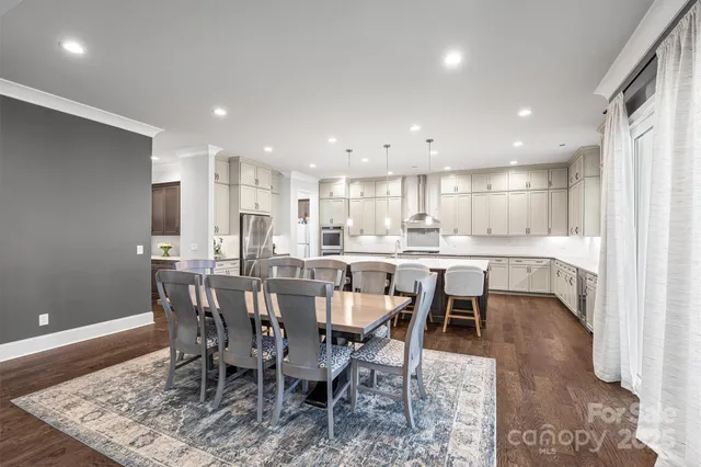 a view of a dining room kitchen and a window