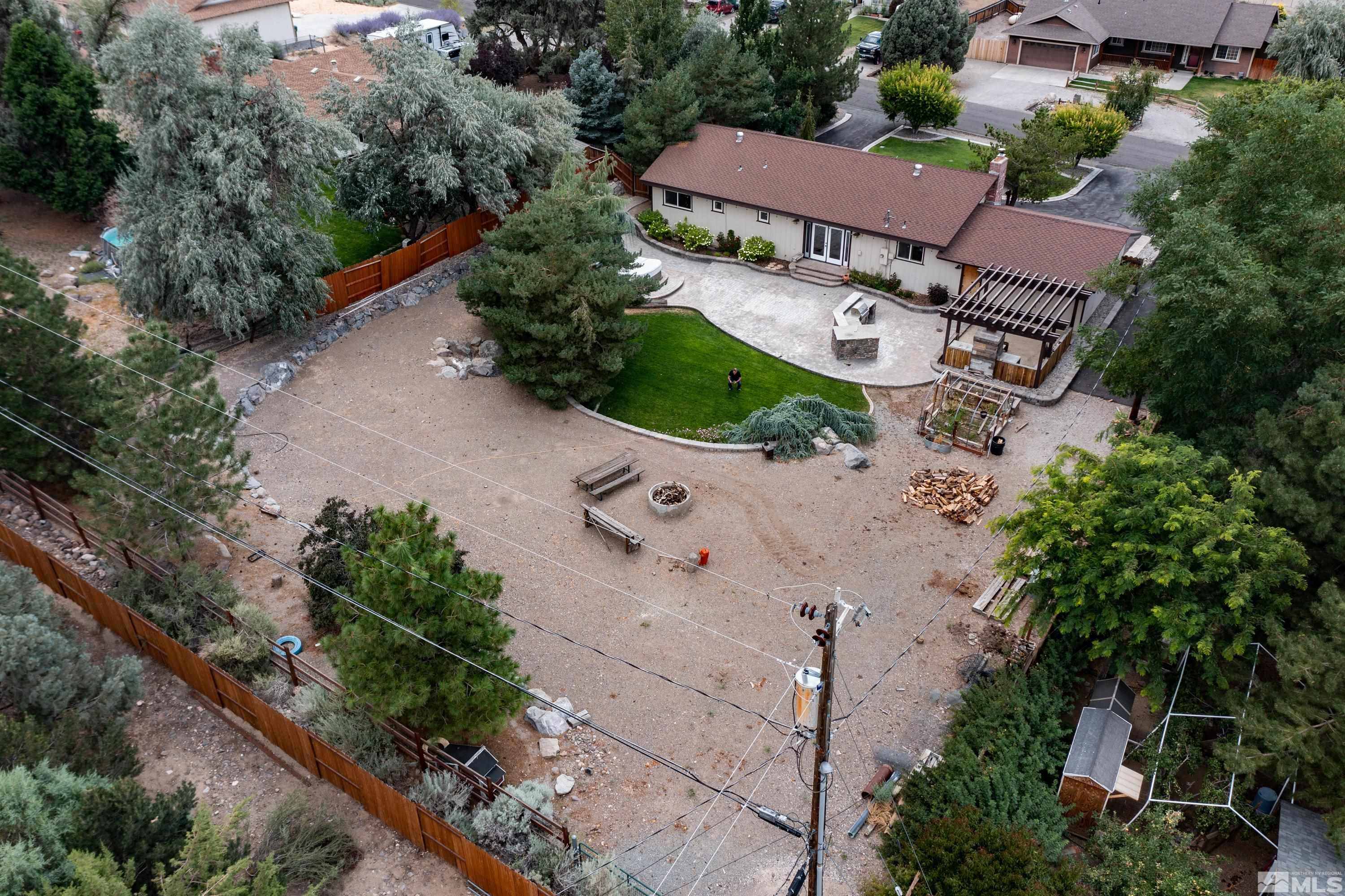 13750 Rancheros Drive Reno, NV 89521 - Photo 39 of 39 an aerial view of a house with garden space and street view