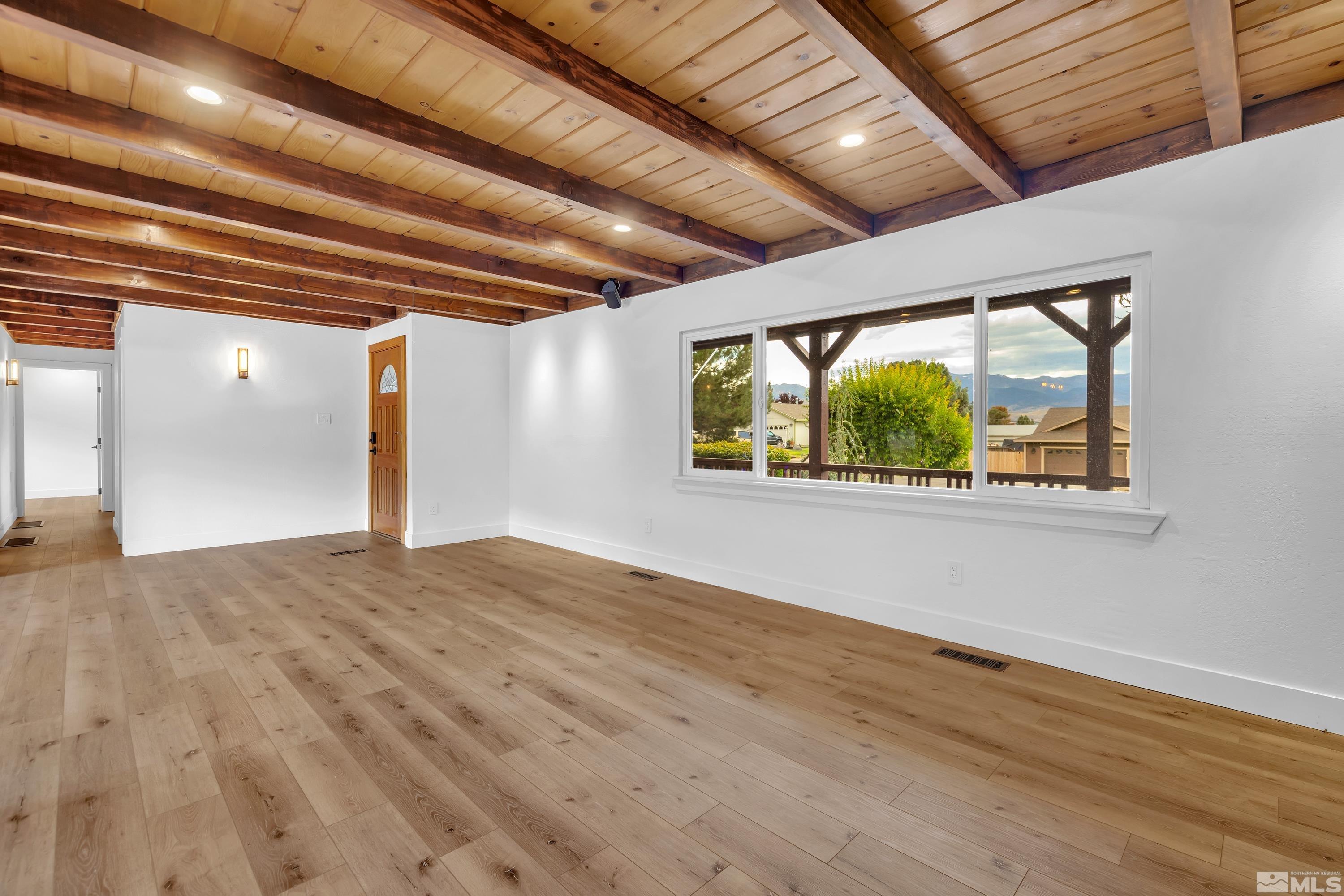 13750 Rancheros Drive Reno, NV 89521 - Photo 8 of 39 a view of an empty room with a window