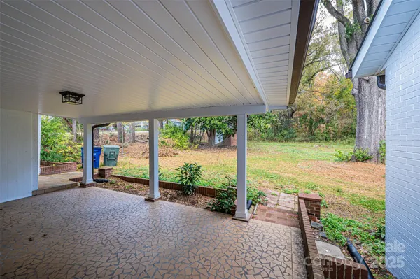 a house view with a garden space