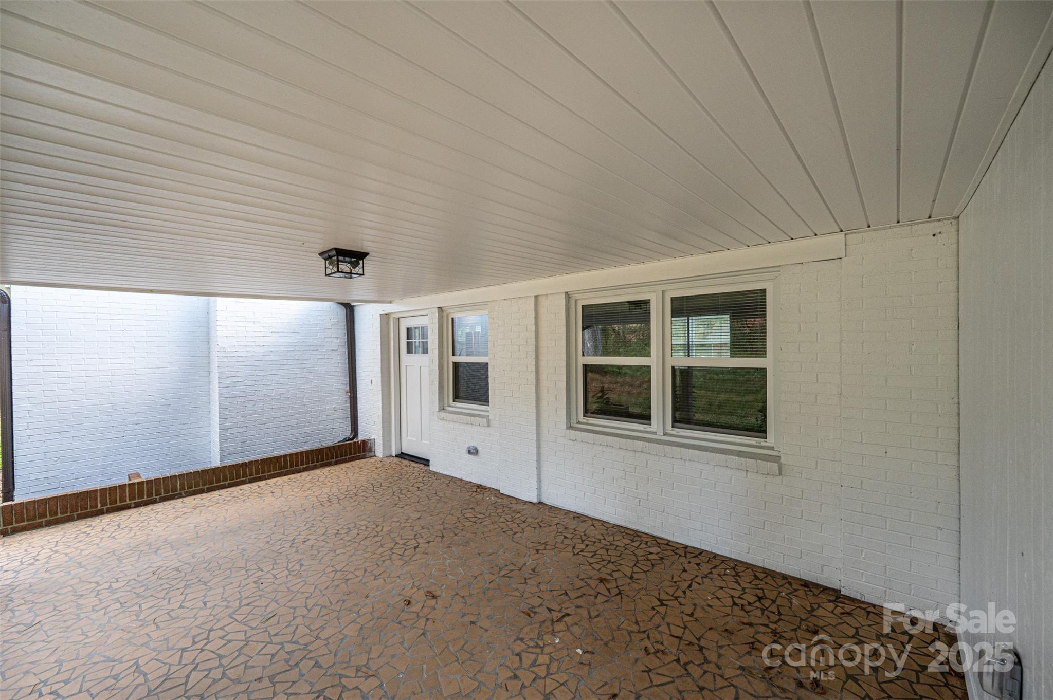 908 13th Street Northwest Conover, NC 28613 - Photo 23 of 25 a view of an empty room with a window