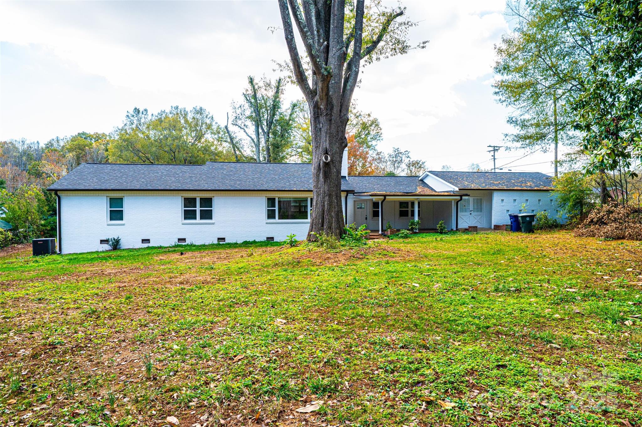 908 13th Street Northwest Conover, NC 28613 - Photo 25 of 25 a front view of a house with a garden