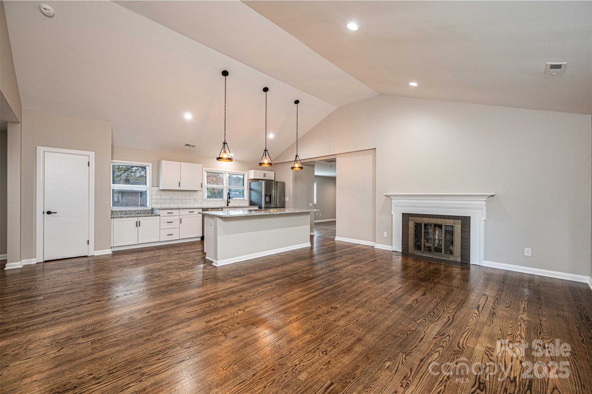 908 13th Street Northwest Conover, NC 28613 - Photo 7 of 25 a view of kitchen with cabinets and wooden floor