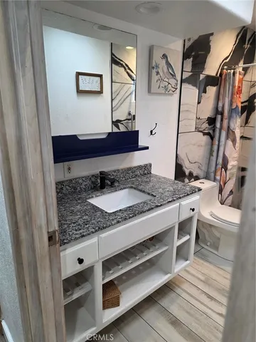 a view of a kitchen from the hallway