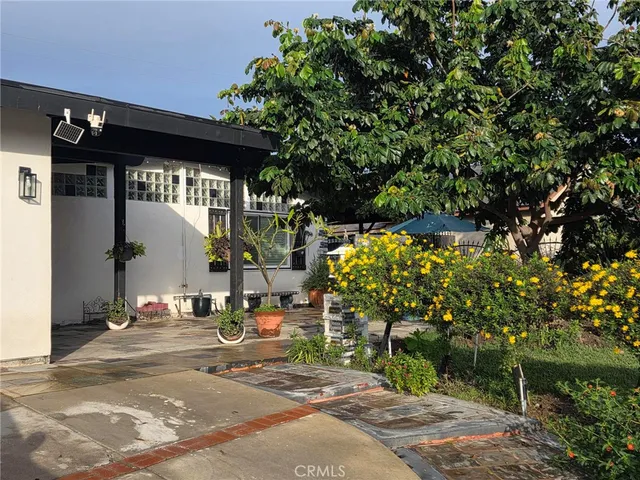 a backyard of a house with lots of green space