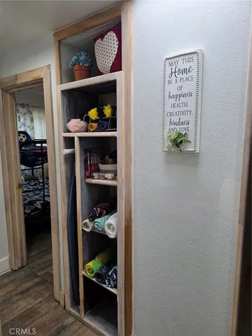 a room with a book shelf
