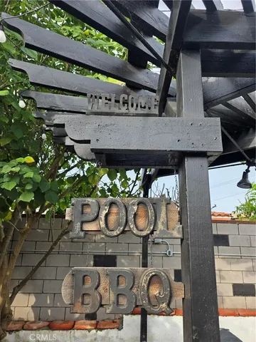a view of balcony with wooden floor and outdoor seating