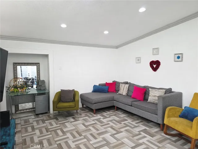 a living room with furniture and a couch