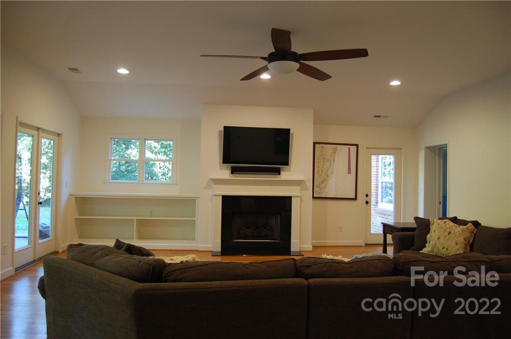 3101 Colony Road Charlotte, NC 28211 - Photo 11 of 26 a living room with furniture and a flat screen tv