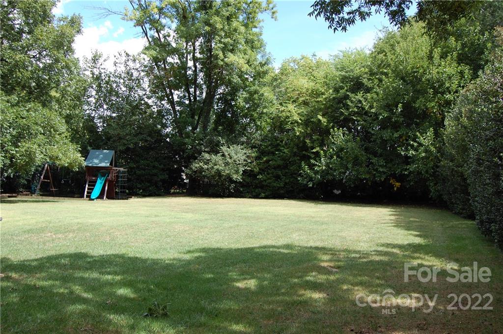 3101 Colony Road Charlotte, NC 28211 - Photo 13 of 26 a view of a field with an trees