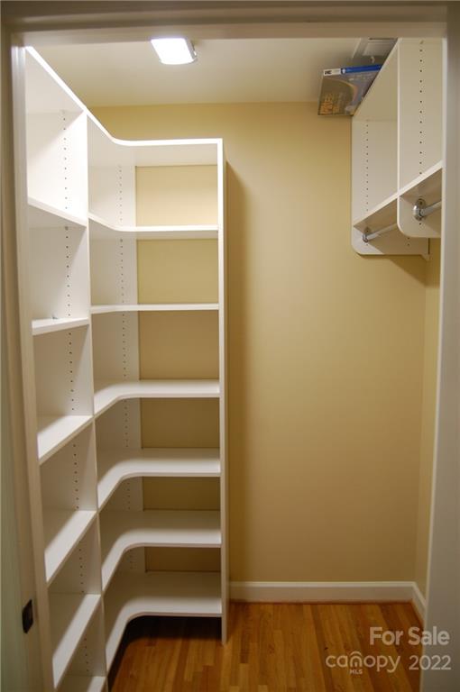 3101 Colony Road Charlotte, NC 28211 - Photo 15 of 26 a view of walk in closet with empty racks