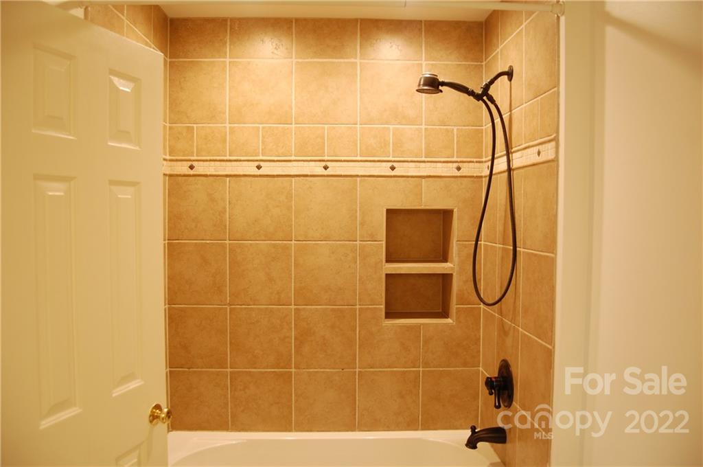 3101 Colony Road Charlotte, NC 28211 - Photo 22 of 26 a bathroom with a shower