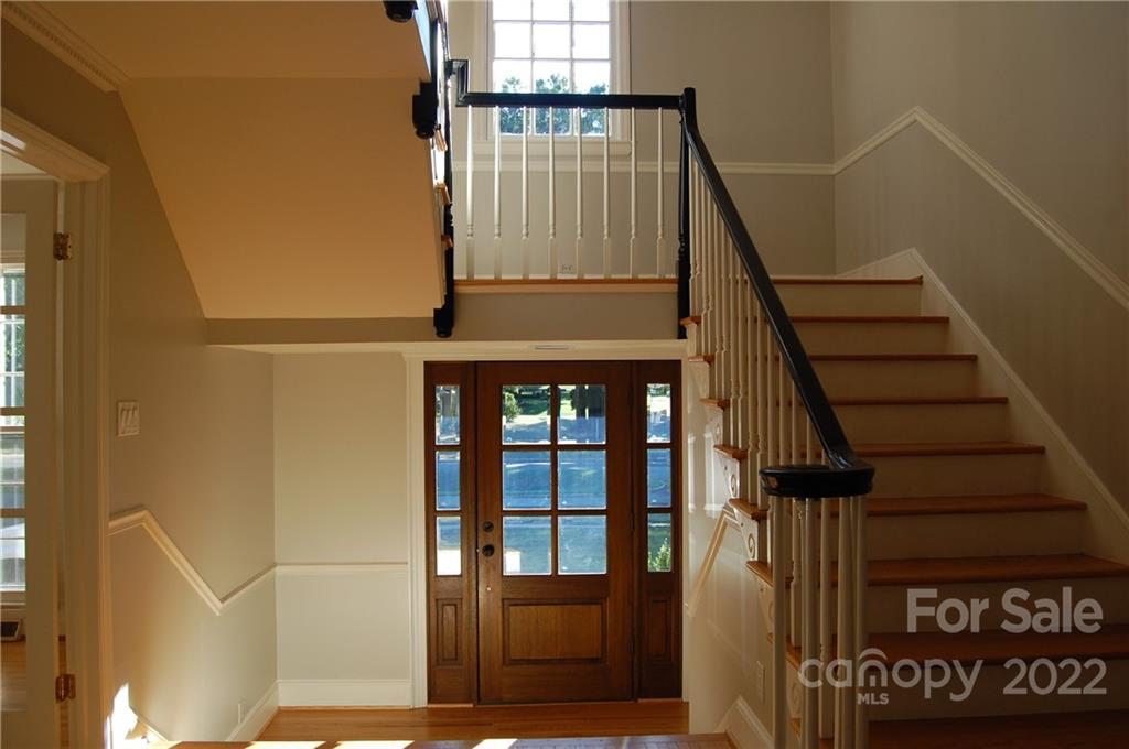 3101 Colony Road Charlotte, NC 28211 - Photo 3 of 26 a view of staircase with railing and a window