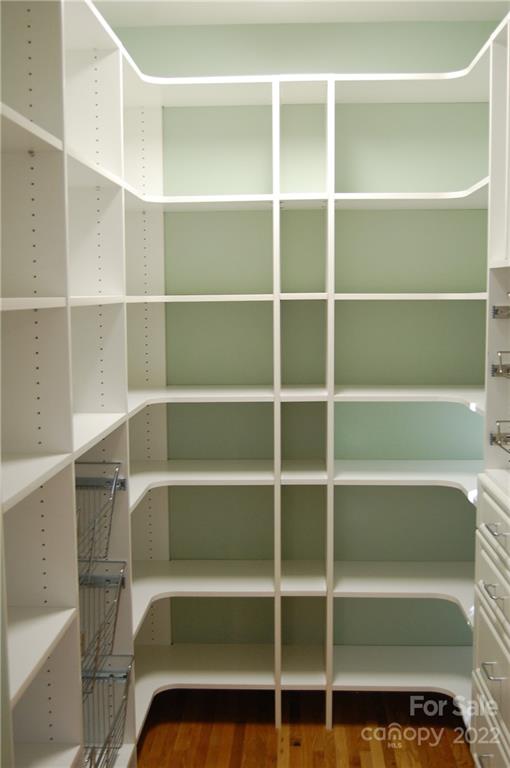 3101 Colony Road Charlotte, NC 28211 - Photo 8 of 26 a view of walk in closet with empty racks