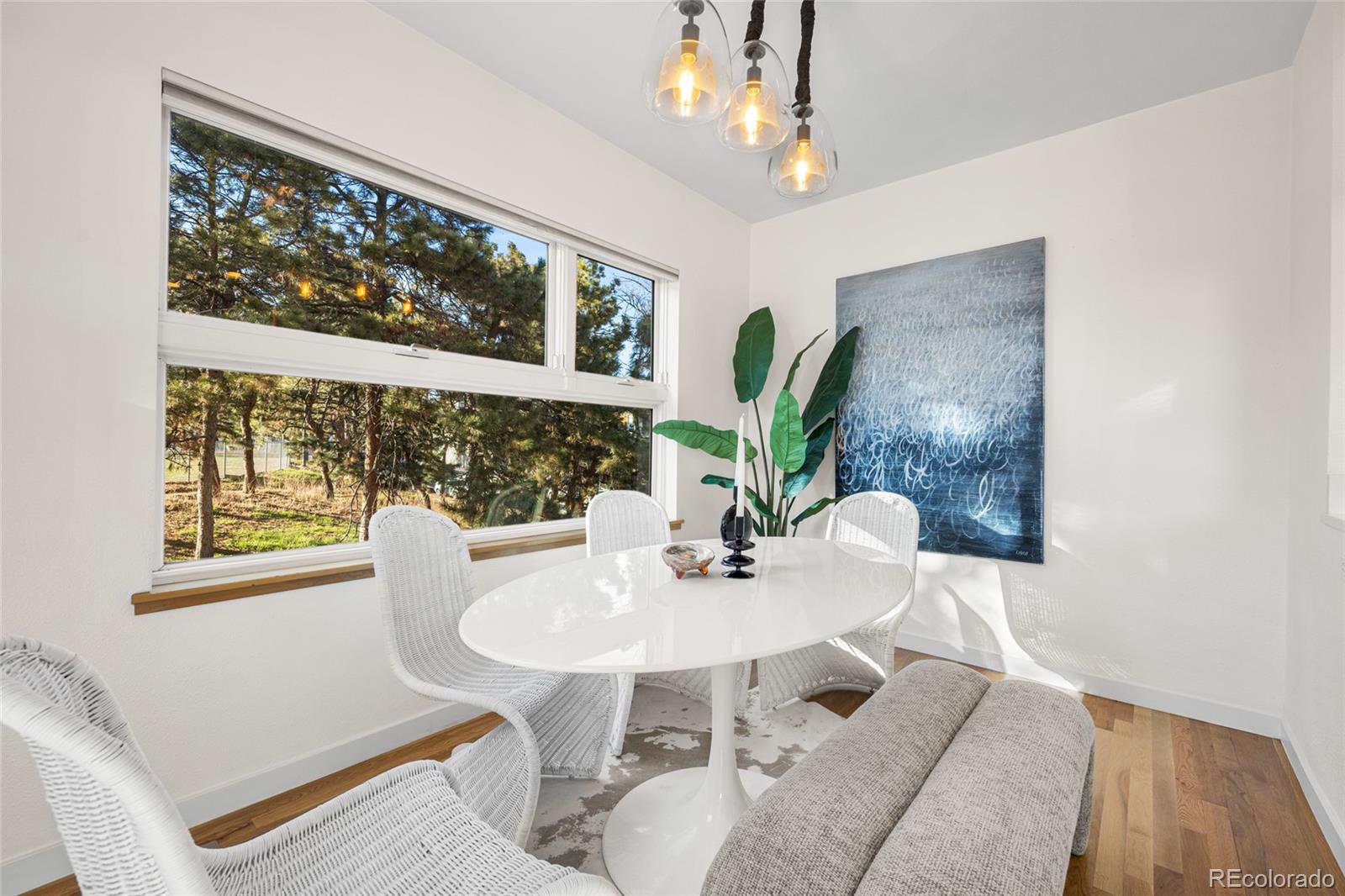 1675 Boulder Street Denver, CO 80211 - Photo 14 of 39 a view of a dining room with furniture window and outside view