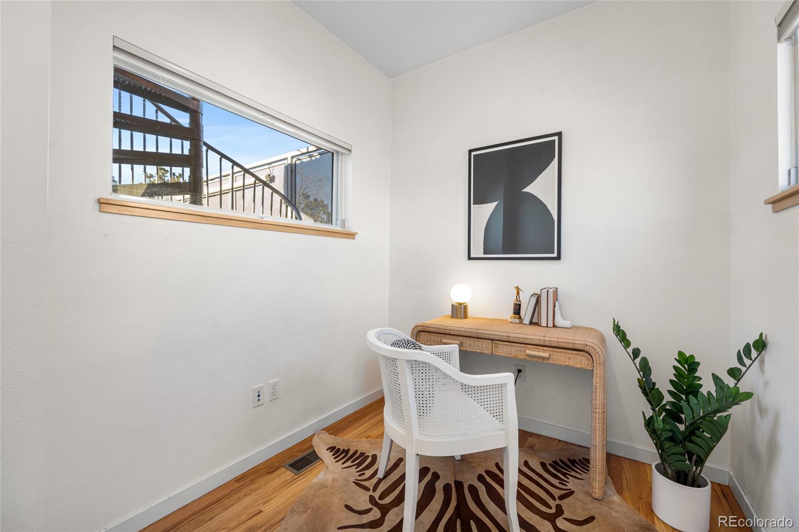 1675 Boulder Street Denver, CO 80211 - Photo 18 of 39 a dining room with a table and chairs