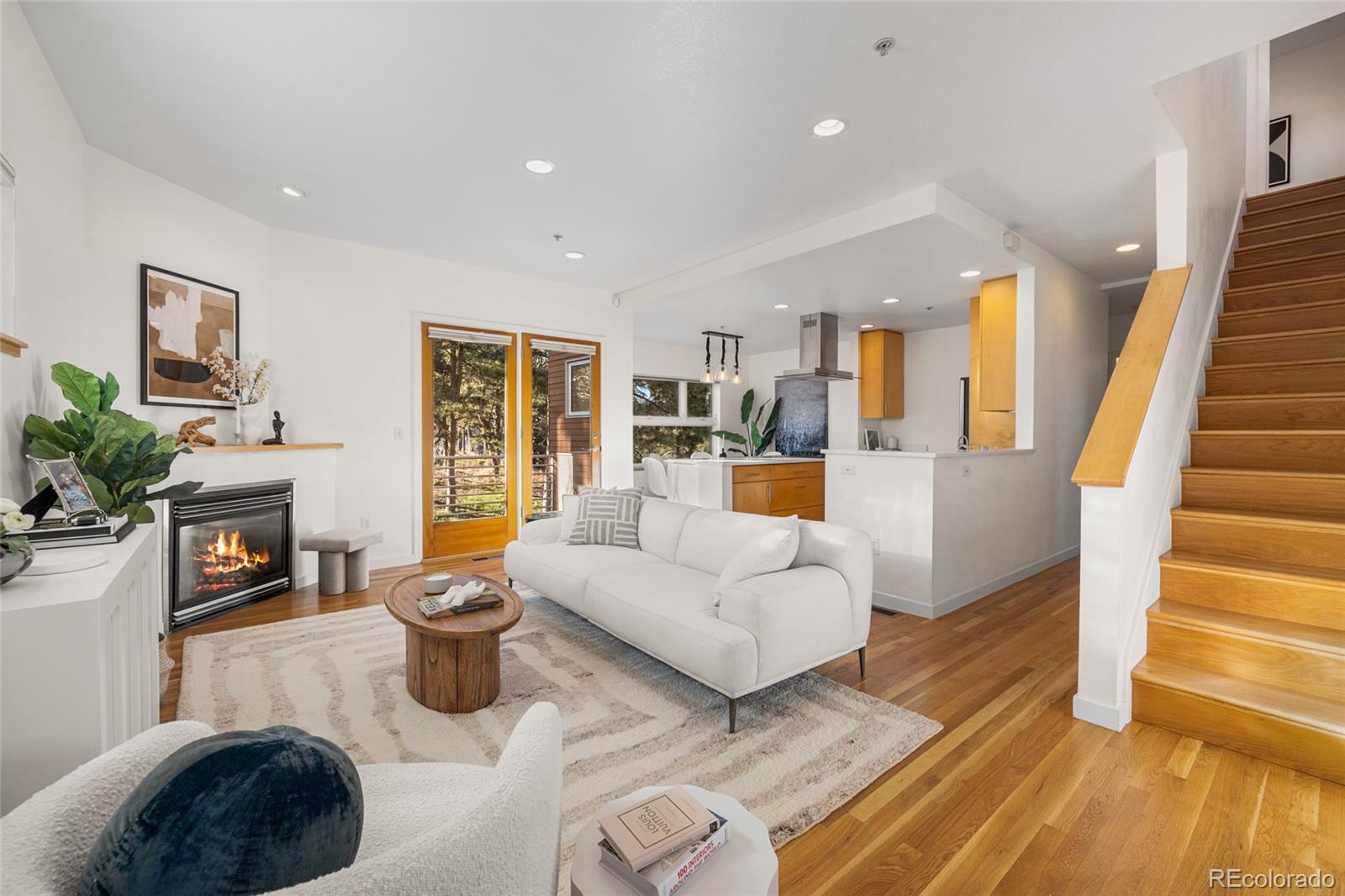 1675 Boulder Street Denver, CO 80211 - Photo 8 of 39 a living room with furniture and a fireplace