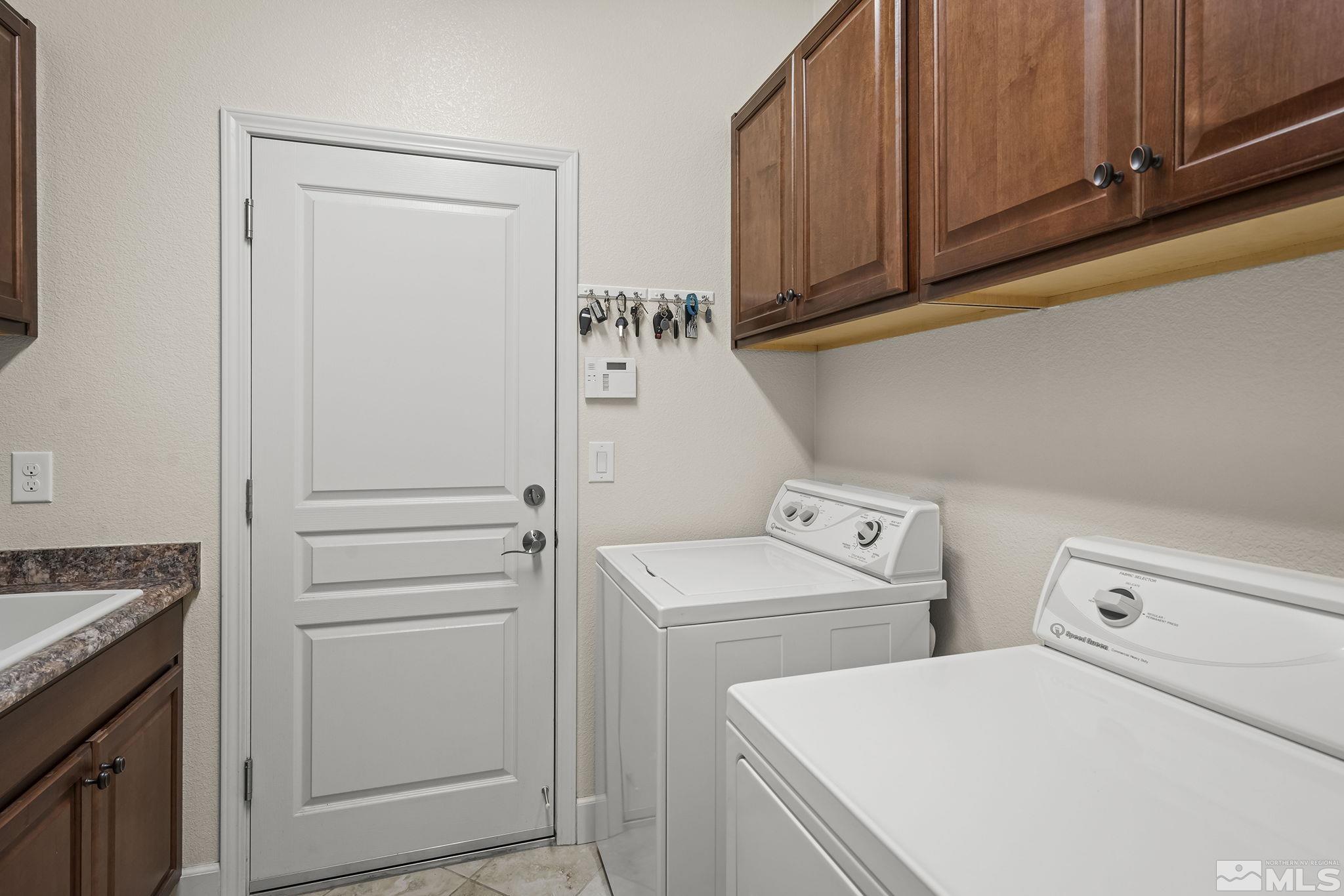 9092 Kenton Trail Reno, NV 89523 - Photo 29 of 34 a utility room with dryer and washer