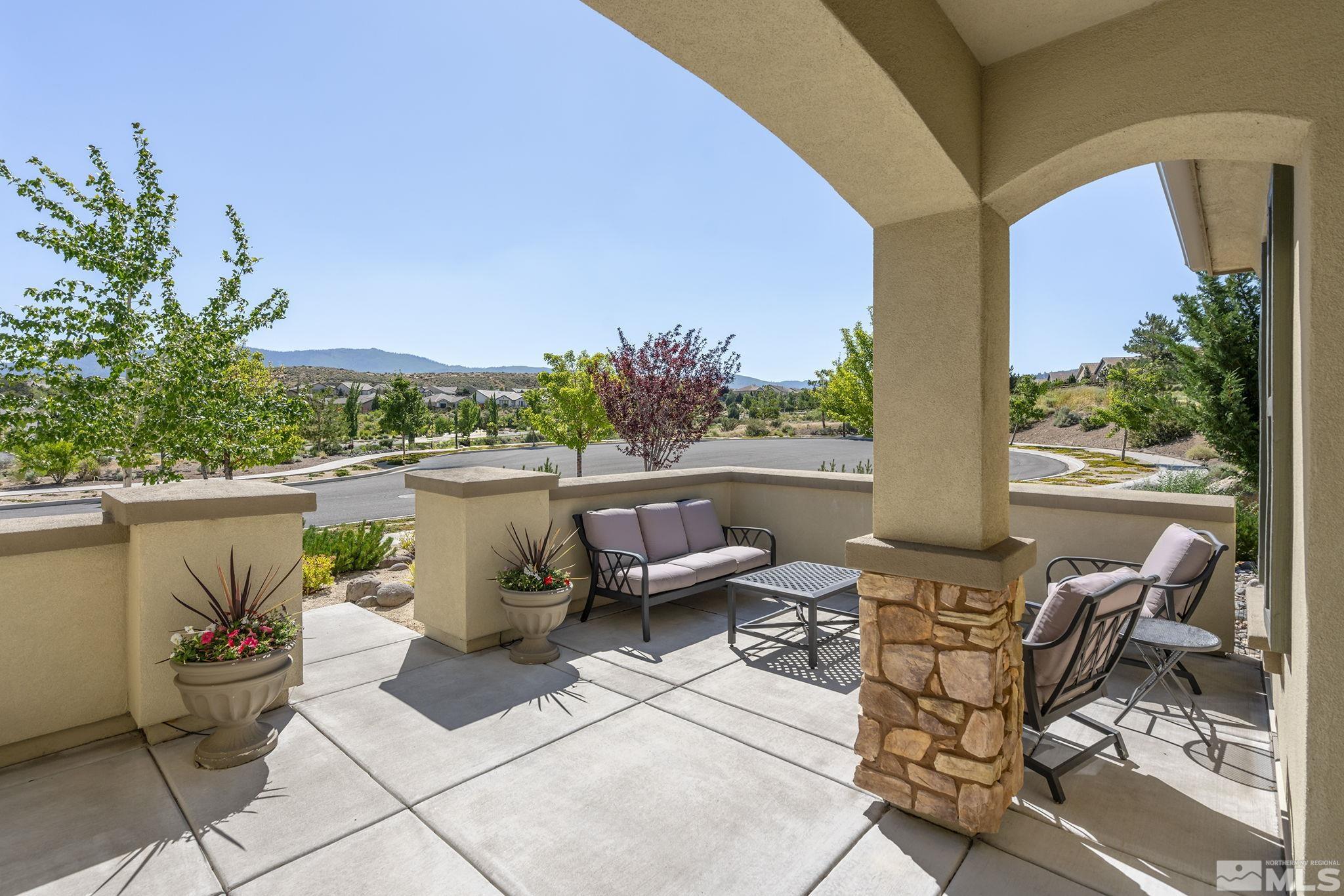 9092 Kenton Trail Reno, NV 89523 - Photo 3 of 34 a view of balcony with furniture and a potted plant