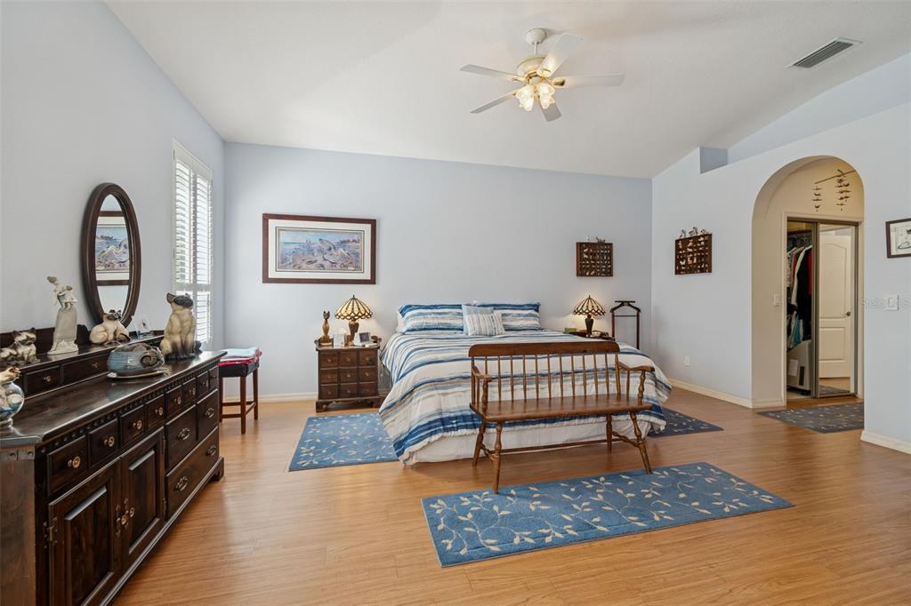 928 Oakview Road Tarpon Springs, FL 34689 - Photo 26 of 75 a living room with furniture piano and a rug