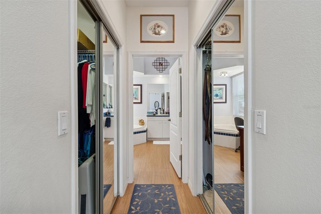 928 Oakview Road Tarpon Springs, FL 34689 - Photo 29 of 75 a view of a hallway with a livingroom and a bathroom with sink