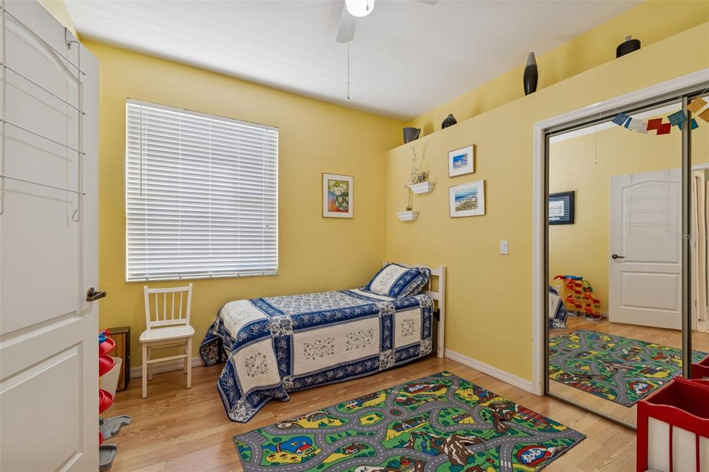 928 Oakview Road Tarpon Springs, FL 34689 - Photo 39 of 75 a bedroom with a bed and a window