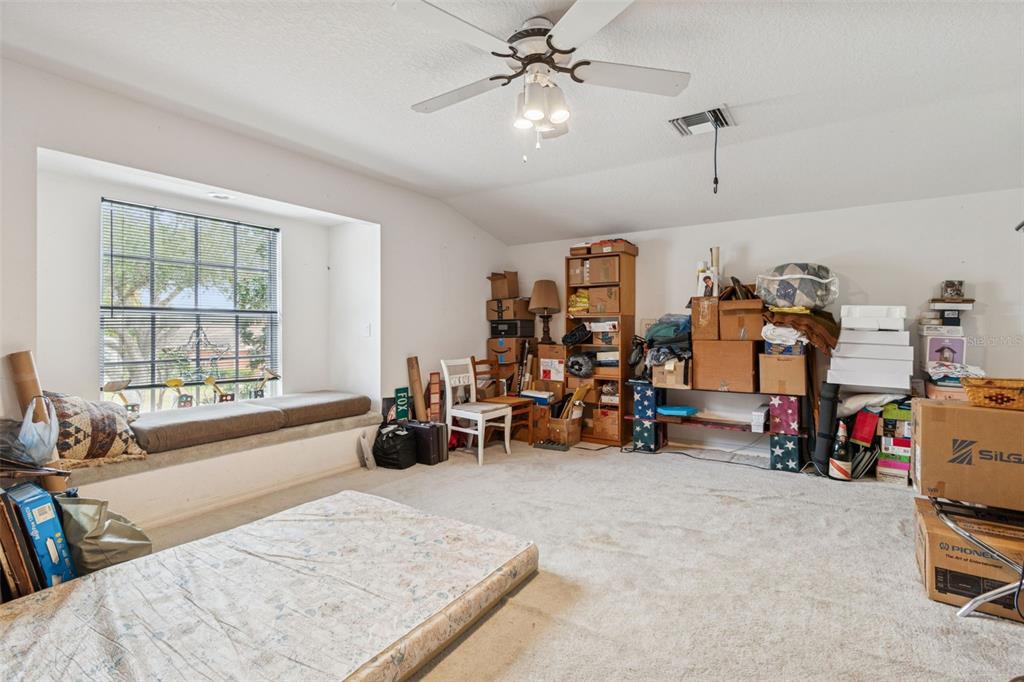 928 Oakview Road Tarpon Springs, FL 34689 - Photo 51 of 75 a view of a livingroom with furniture and a chandelier