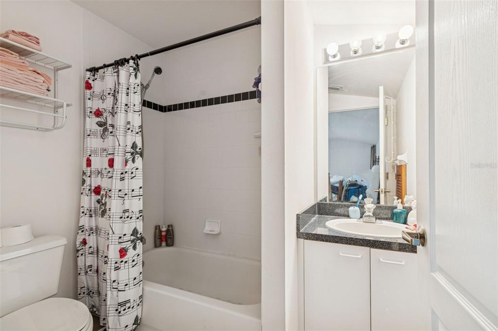 928 Oakview Road Tarpon Springs, FL 34689 - Photo 52 of 75 a bathroom with a sink toilet and shower