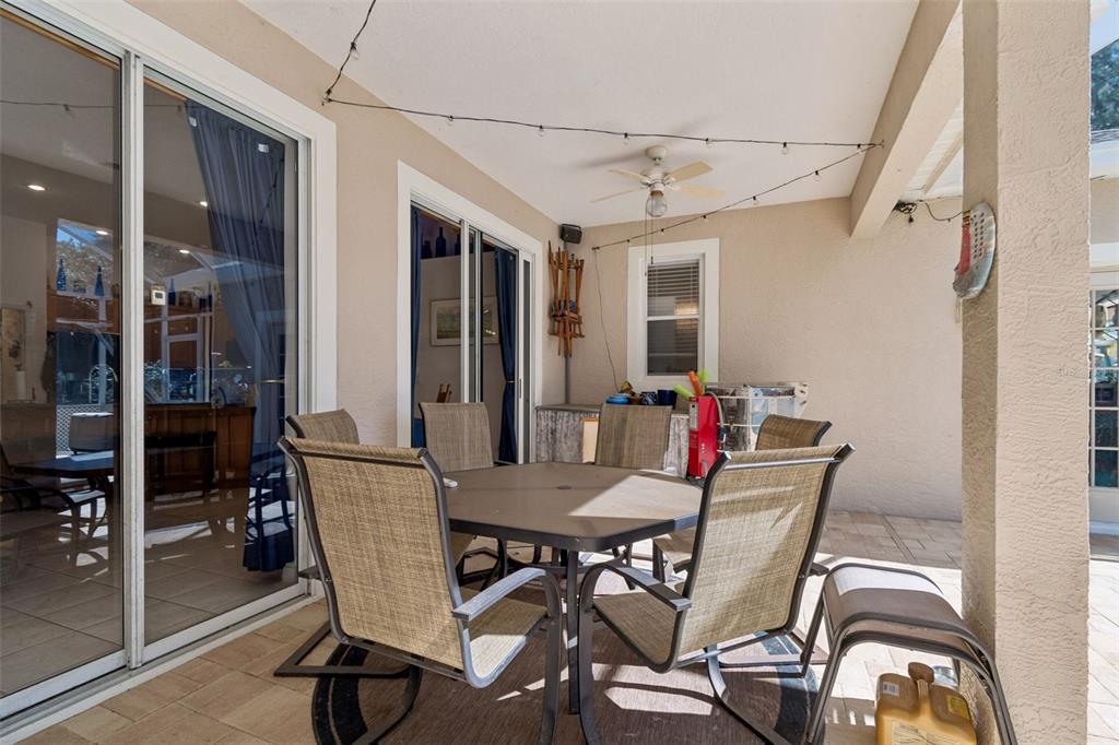 928 Oakview Road Tarpon Springs, FL 34689 - Photo 54 of 75 a view of a dining room with furniture and a table