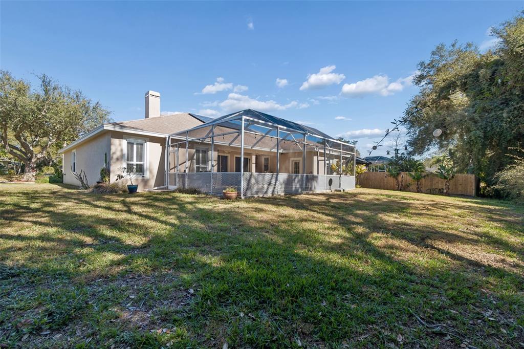 928 Oakview Road Tarpon Springs, FL 34689 - Photo 59 of 75 a front view of a house with a yard