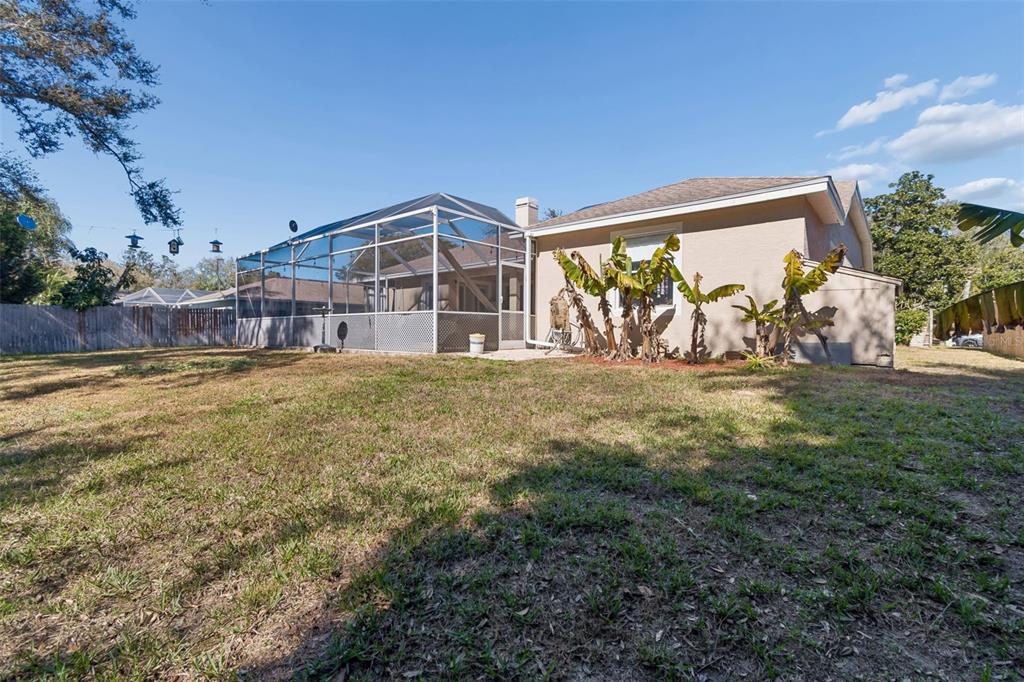 928 Oakview Road Tarpon Springs, FL 34689 - Photo 60 of 75 a view of a house with a big yard
