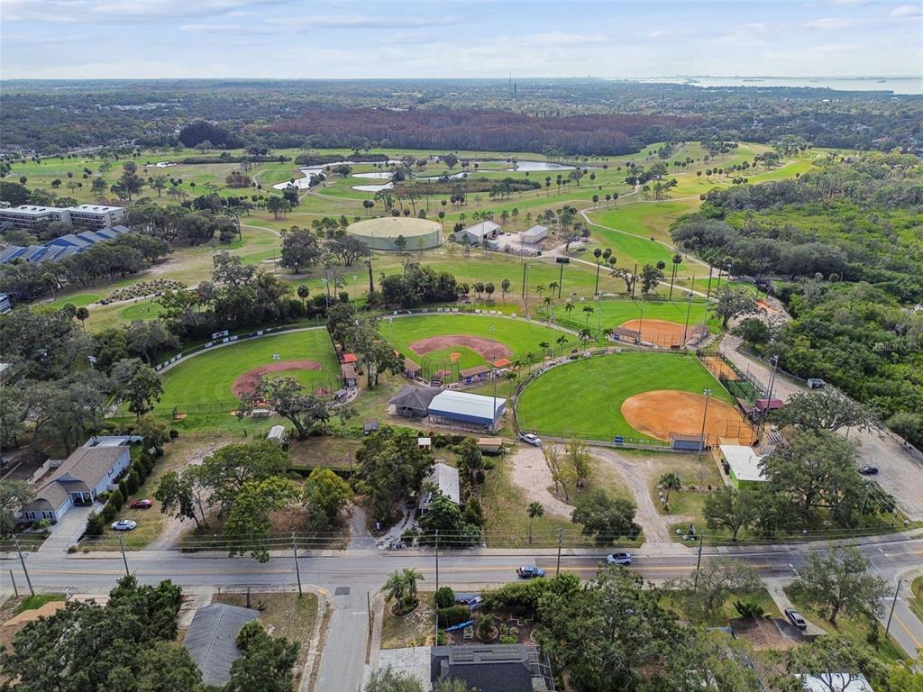 928 Oakview Road Tarpon Springs, FL 34689 - Photo 64 of 75 an aerial view of residential houses with outdoor space and street view