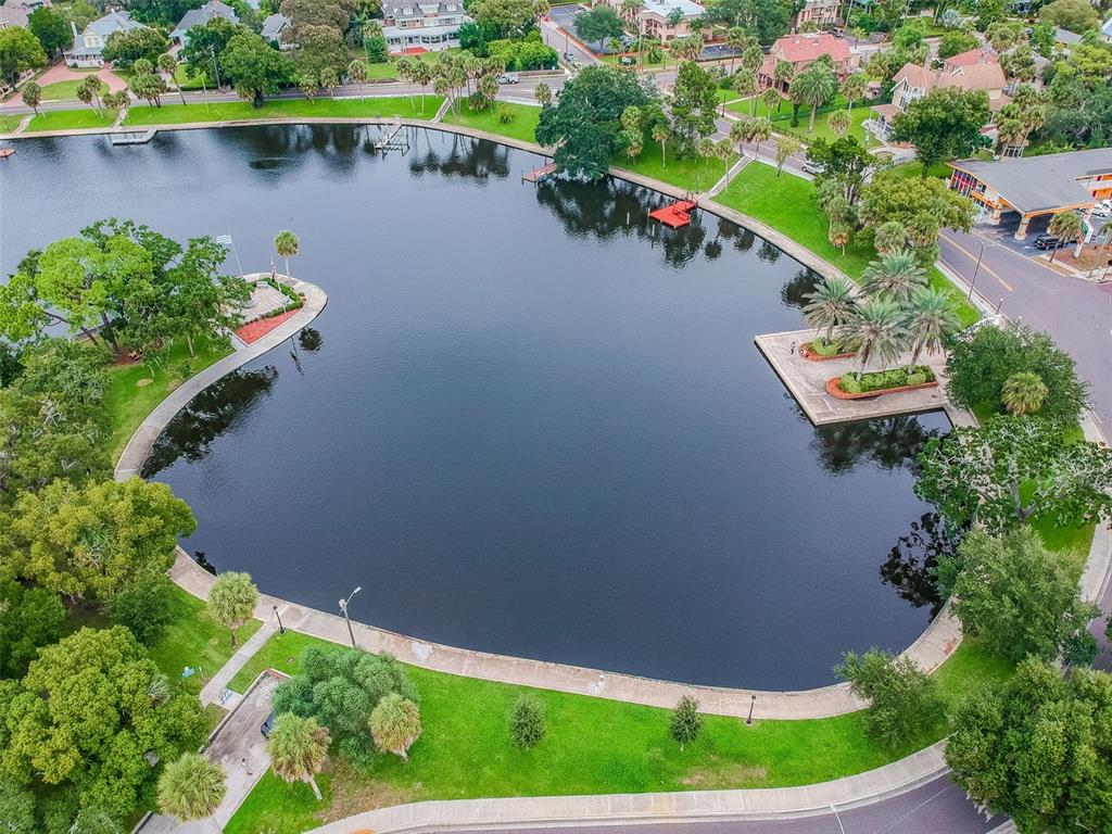 928 Oakview Road Tarpon Springs, FL 34689 - Photo 70 of 75 an aerial view of house with yard swimming pool and outdoor seating