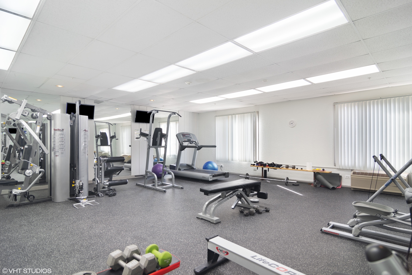 1 Renaissance Place, Unit 509 Palatine, IL 60067 - Photo 13 of 21 a room with gym equipment and windows