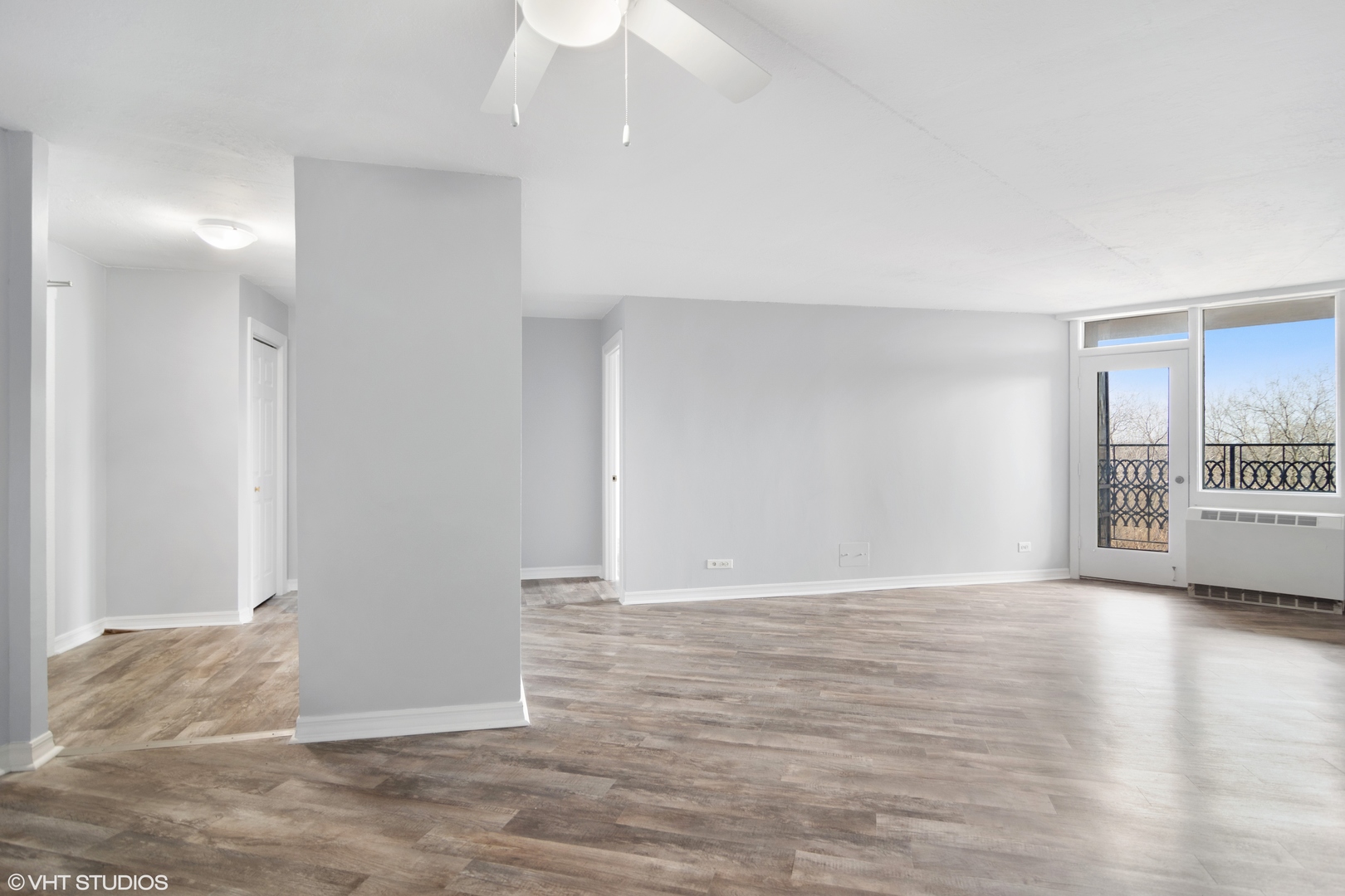 1 Renaissance Place, Unit 509 Palatine, IL 60067 - Photo 3 of 21 a view of an empty room with wooden floor