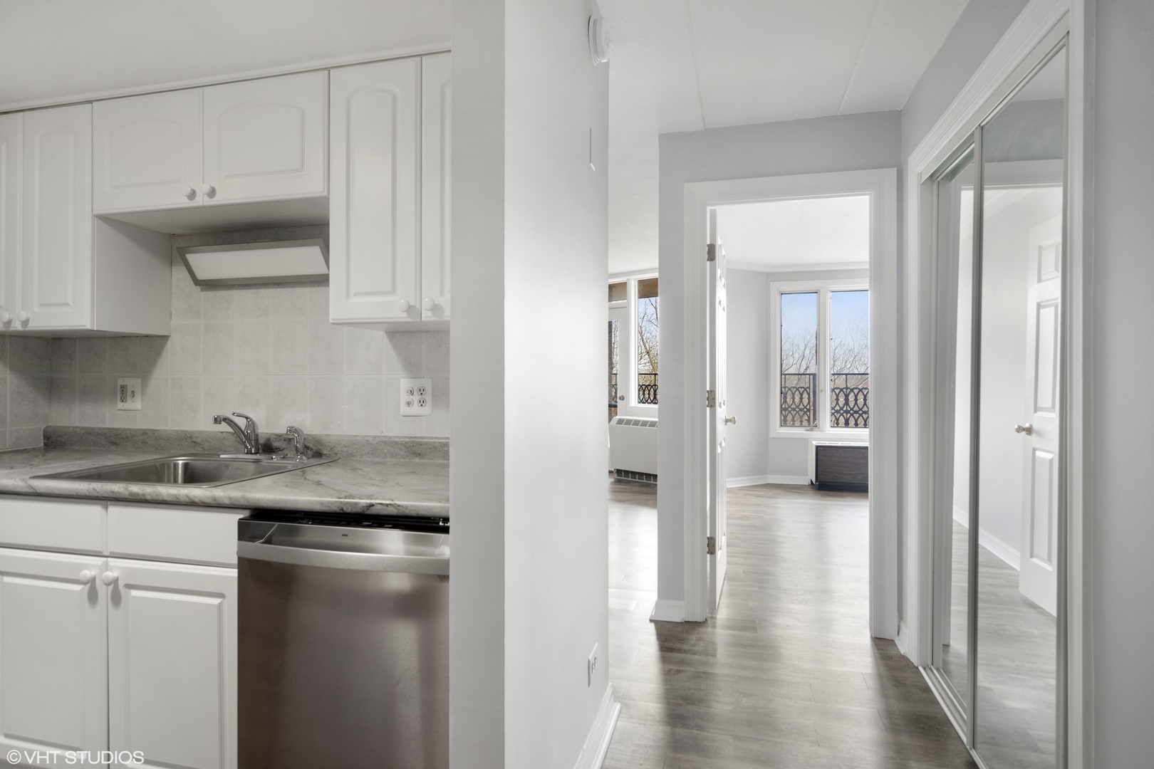 1 Renaissance Place, Unit 509 Palatine, IL 60067 - Photo 5 of 21 a kitchen with a sink and a refrigerator
