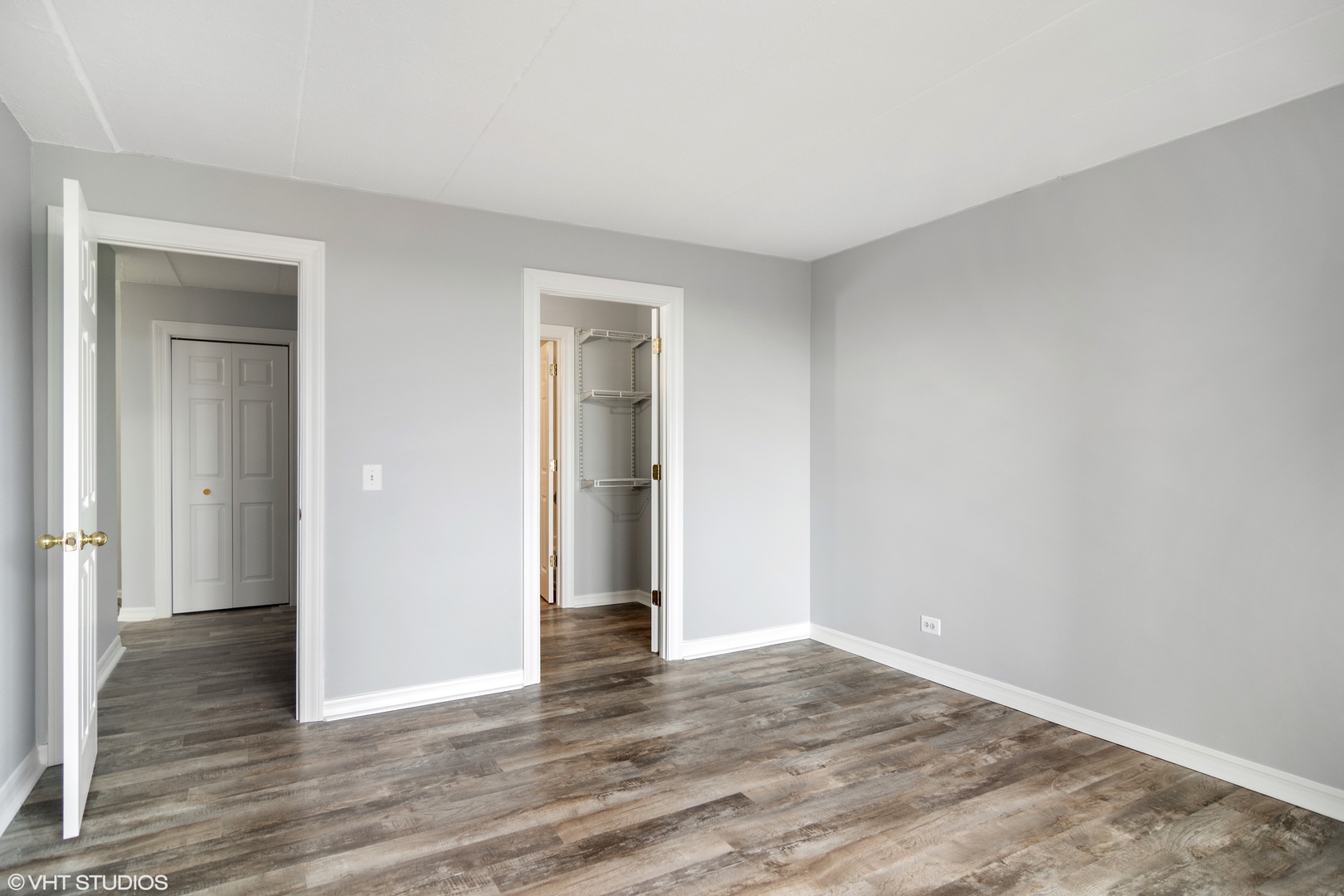 1 Renaissance Place, Unit 509 Palatine, IL 60067 - Photo 7 of 21 a view of an empty room and wooden floor
